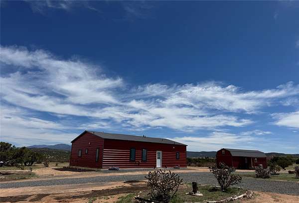 12.5 Acres of Land with Home for Sale in Lamy, New Mexico
