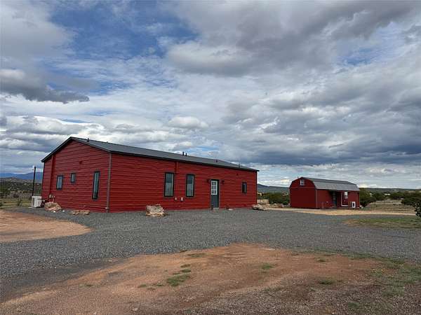 12.5 Acres of Land with Home for Sale in Lamy, New Mexico