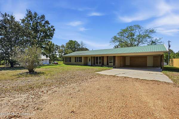 1.5 Acres of Land with Home for Sale in Walnut Grove, Mississippi
