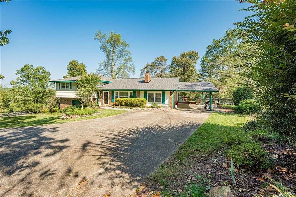 9 Acres of Land with Home for Sale in Ball Ground, Georgia