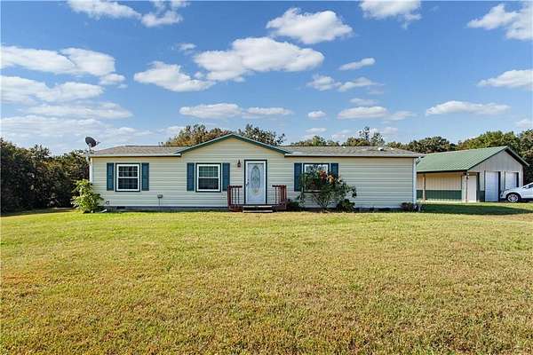 4.88 Acres of Land with Home for Sale in Kingsville, Missouri