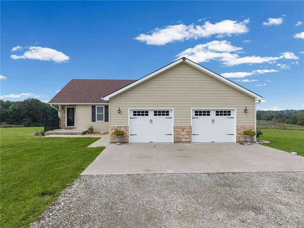 9.9 Acres of Land with Home for Sale in Lathrop, Missouri