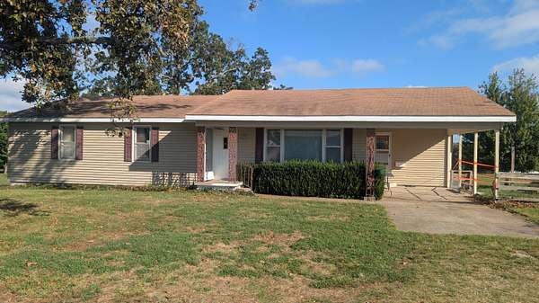 1.7 Acres of Land with Home for Sale in El Dorado Springs, Missouri