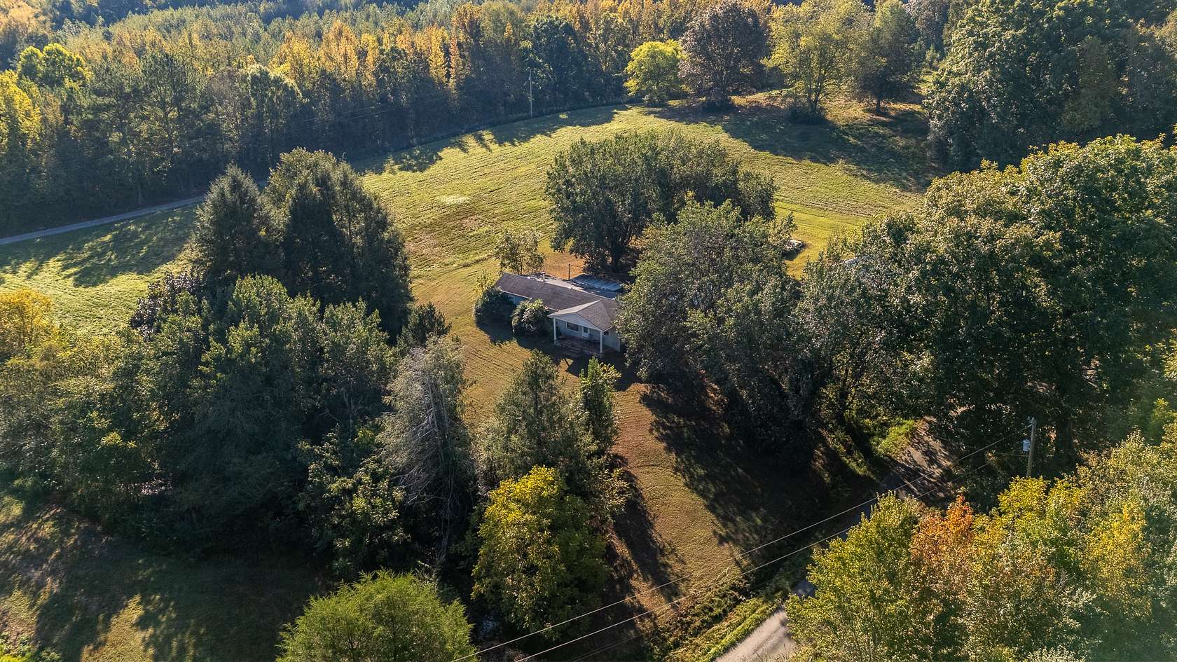 20.1 Acres of Land with Home for Sale in Leoma, Tennessee