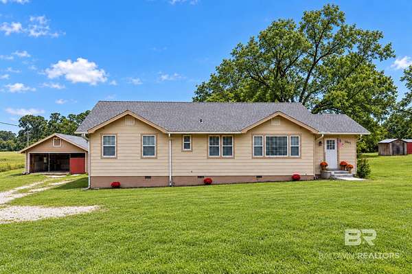 1.5 Acres of Land with Home for Sale in Eight Mile, Alabama