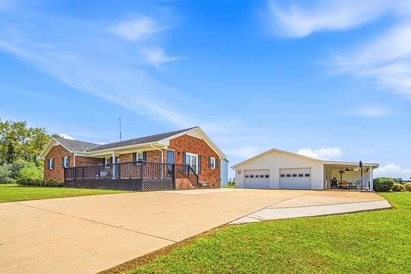 3.8 Acres of Land with Home for Auction in Harvest, Alabama