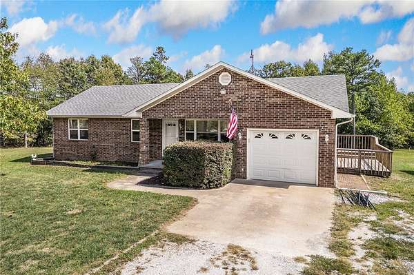 1.55 Acres of Land with Home for Sale in Harrison, Arkansas