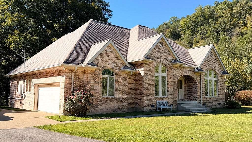 16.9 Acres of Land with Home for Sale in Staffordsville, Kentucky