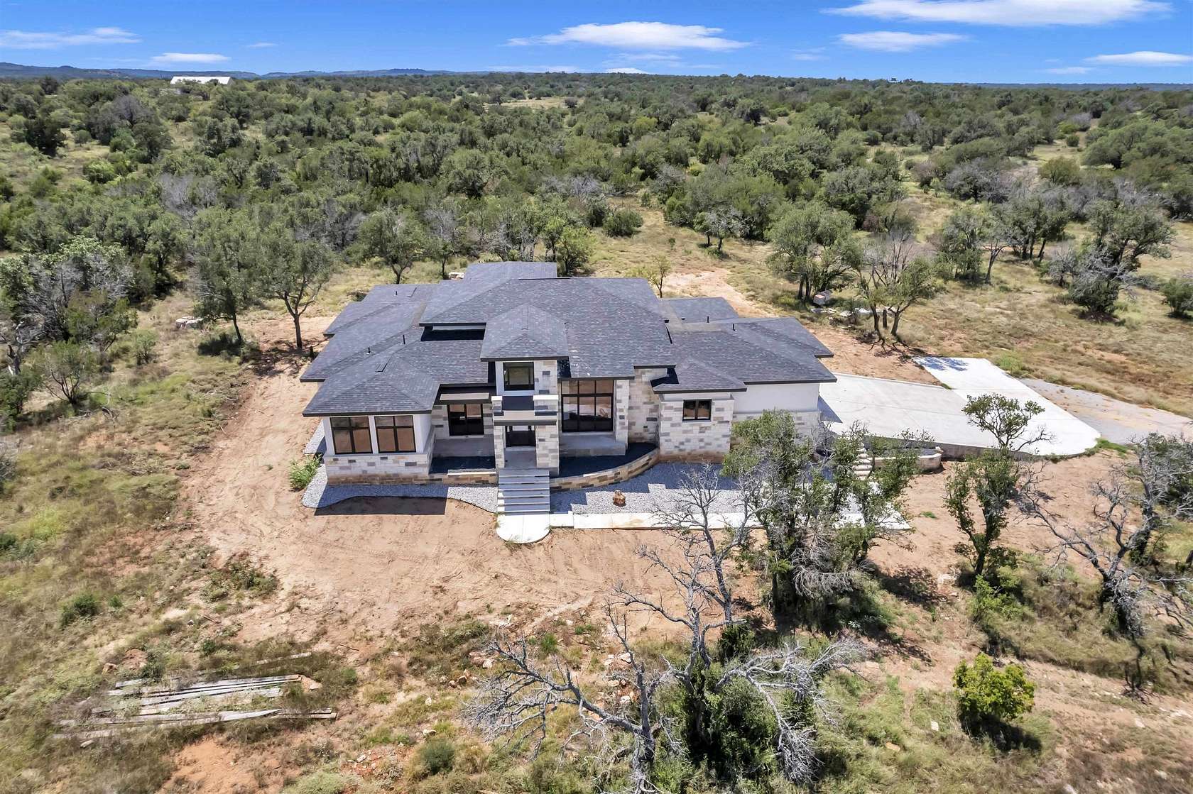 6.56 Acres of Land with Home for Sale in Round Mountain, Texas