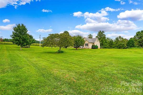 5.82 Acres of Land with Home for Sale in Olin, North Carolina