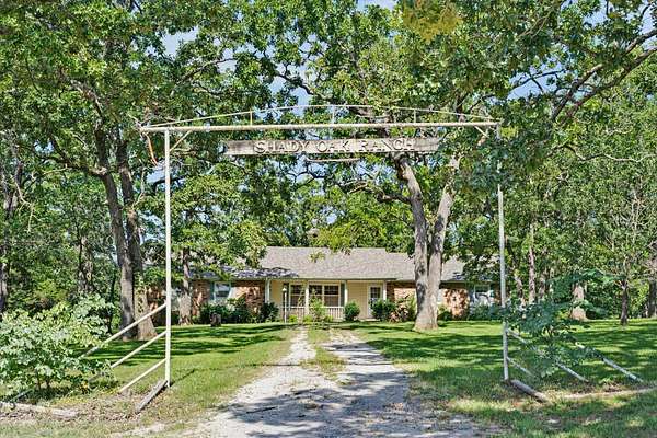 12 Acres of Land with Home for Sale in Wheatland, Missouri