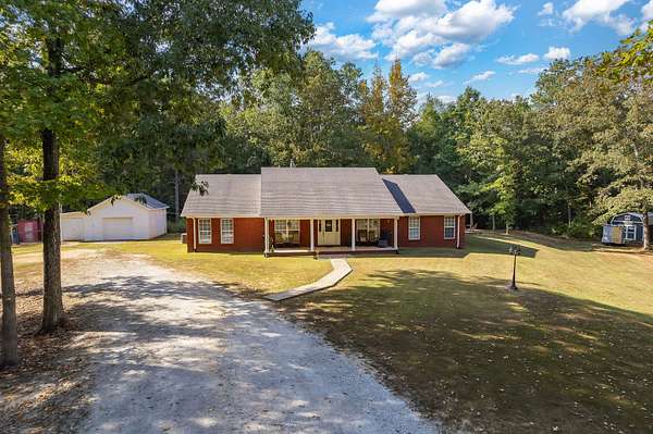 12.4 Acres of Land with Home for Sale in Lexington, Tennessee