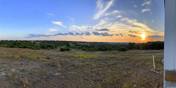12.8 Acres of Land with Home for Sale in Blanco, Texas
