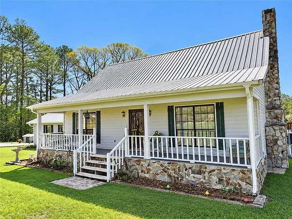 4.8 Acres of Land with Home for Sale in Millry, Alabama