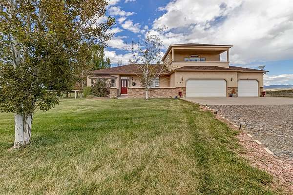 3 Acres of Land with Home for Sale in Loma, Colorado