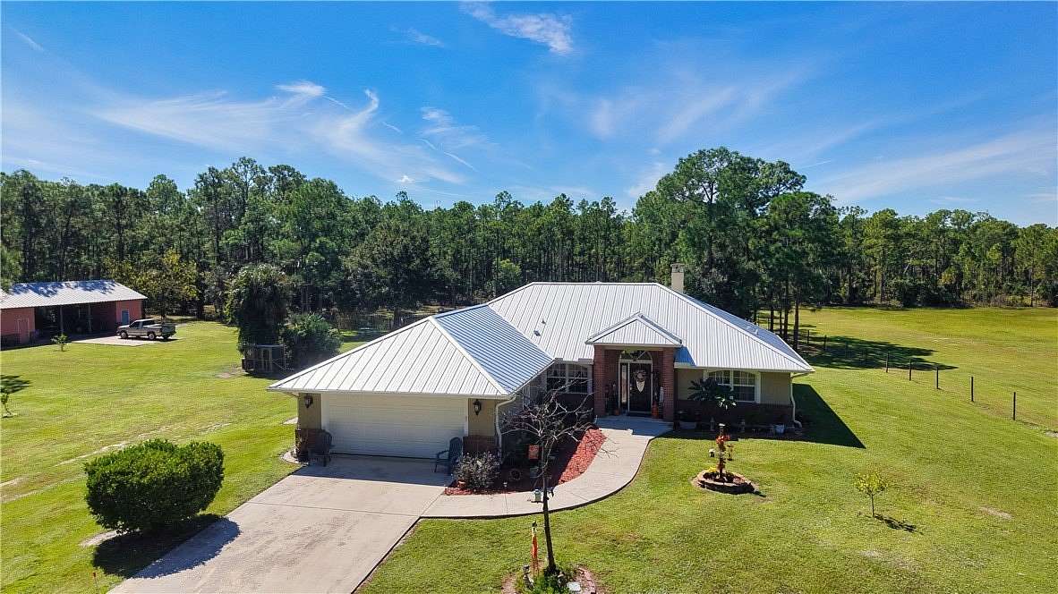 8.9 Acres of Land with Home for Sale in Fellsmere, Florida
