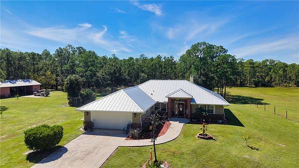 8.9 Acres of Land with Home for Sale in Fellsmere, Florida