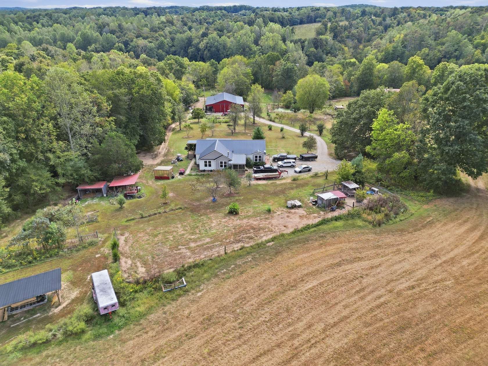 70.3 Acres of Recreational Land with Home for Auction in Red Boiling Springs, Tennessee