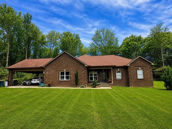 5 Acres of Land with Home for Sale in Cedar Hill, Tennessee