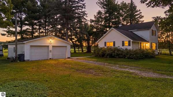 5 Acres of Land with Home for Sale in Kingsley, Michigan