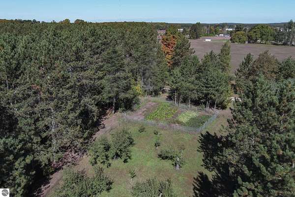 30 Acres of Land with Home for Sale in Kalkaska, Michigan