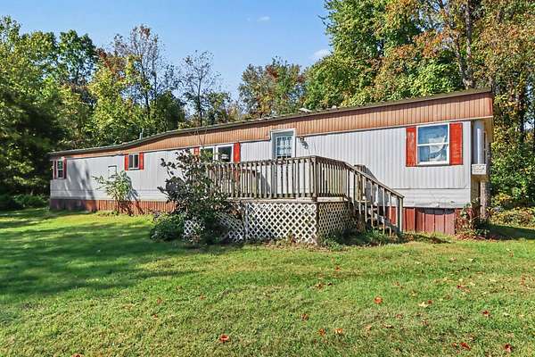 19 Acres of Land with Home for Sale in Delton, Michigan