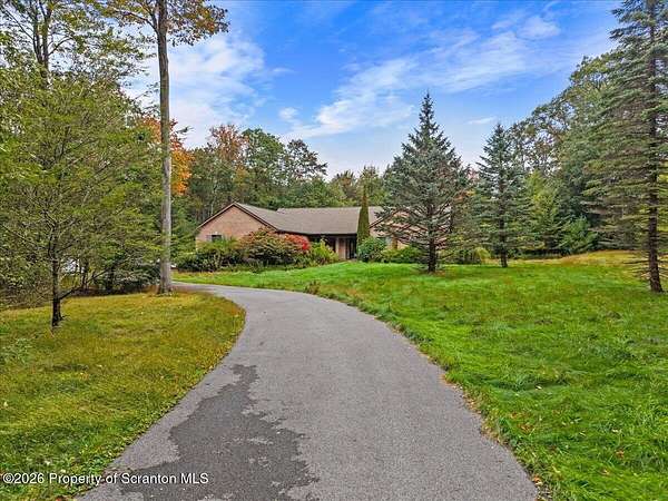 2.84 Acres of Land with Home for Sale in Tobyhanna, Pennsylvania