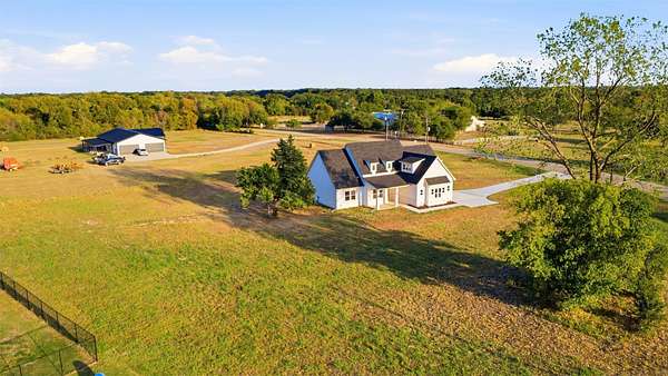1.64 Acres of Land with Home for Sale in Greenville, Texas