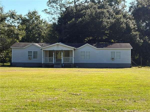 1.56 Acres of Land with Home for Sale in Grand Bay, Alabama