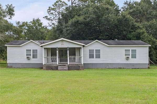 1.56 Acres of Land with Home for Sale in Grand Bay, Alabama