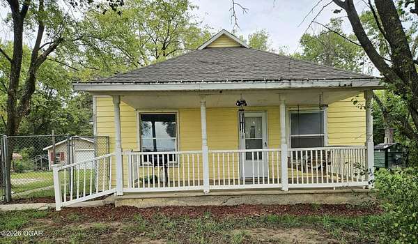 2.9 Acres of Land with Home for Sale in Pittsburg, Kansas