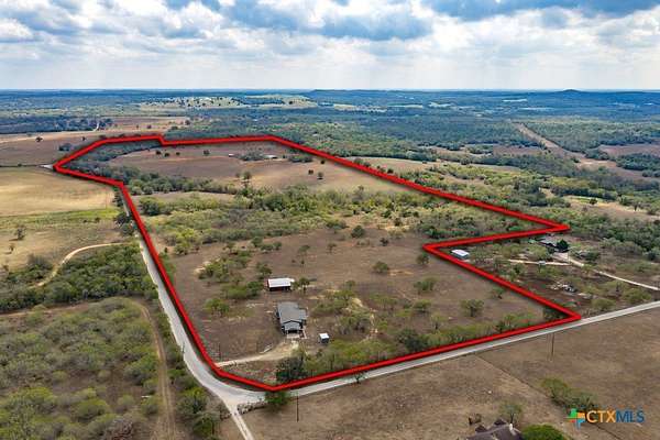 81.9 Acres of Agricultural Land with Home for Sale in Dale, Texas