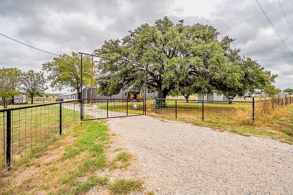 10.3 Acres of Land with Home for Sale in Mineral Wells, Texas