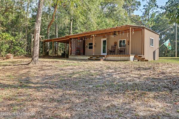 5.56 Acres of Land with Home for Sale in Perkinston, Mississippi