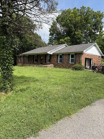 2 Acres of Land with Home for Sale in Cedar Grove, Tennessee