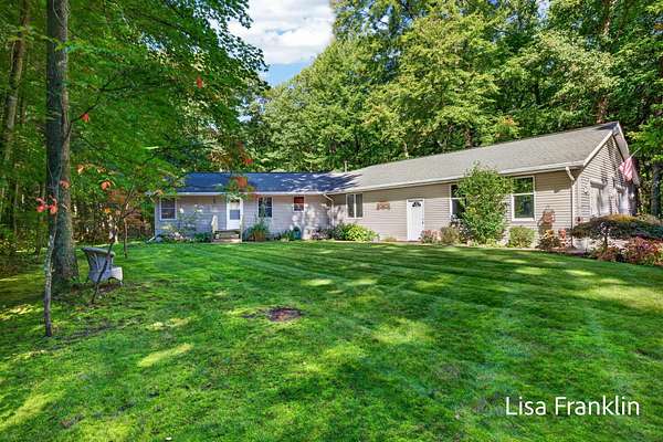 2 Acres of Land with Home for Sale in Spring Lake, Michigan