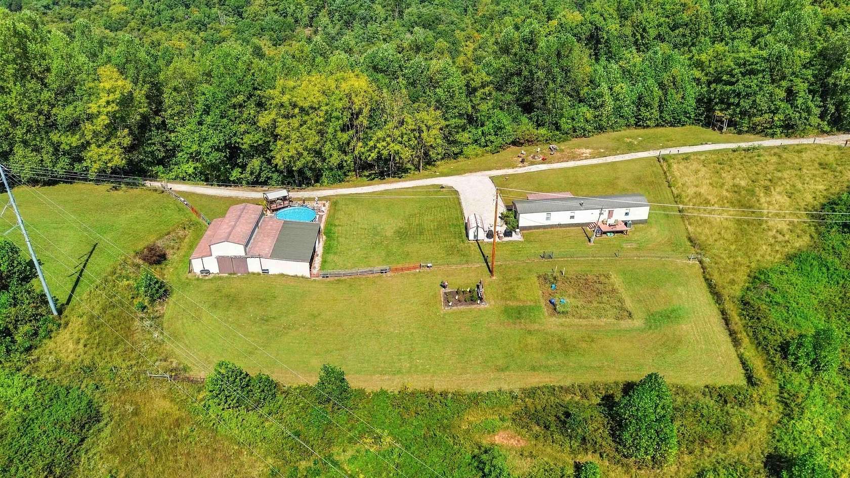 77 Acres of Land with Home for Sale in Mount Vernon, Kentucky