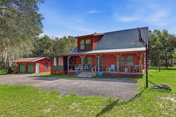 4.7 Acres of Land with Home for Sale in Archer, Florida