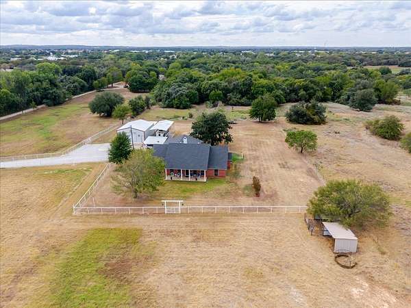 7.62 Acres of Land with Home for Sale in Springtown, Texas
