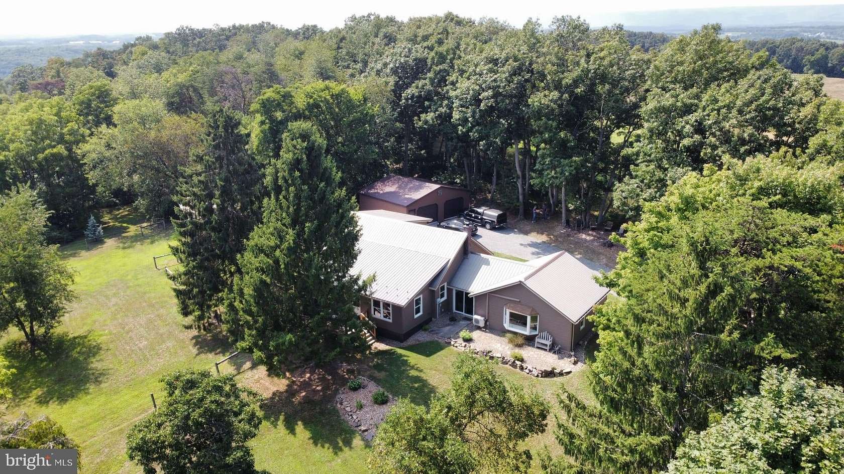 4.35 Acres of Land with Home for Sale in Mount Pleasant Mills, Pennsylvania