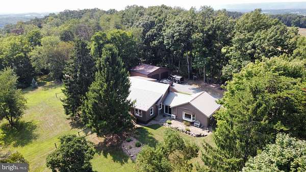 4.35 Acres of Land with Home for Sale in Mount Pleasant Mills, Pennsylvania