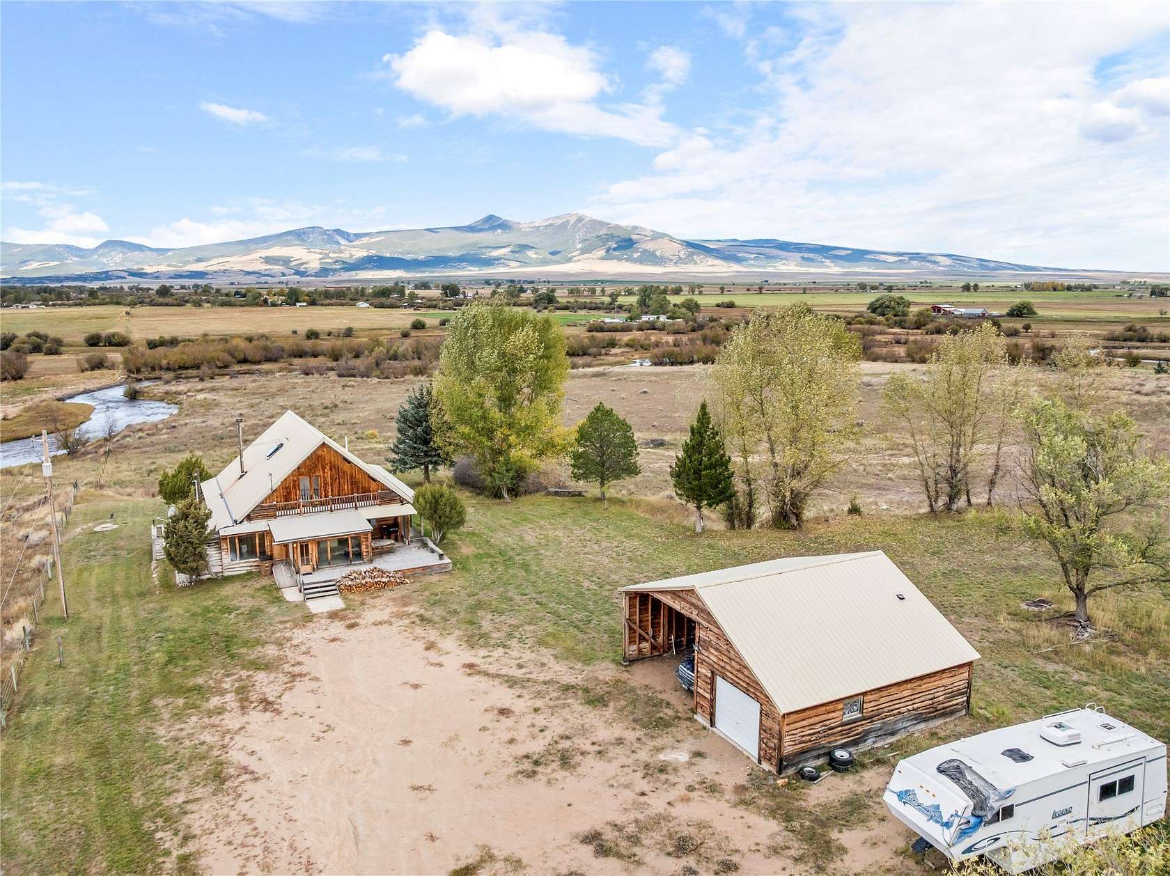 7.6 Acres of Land with Home for Sale in Deer Lodge, Montana