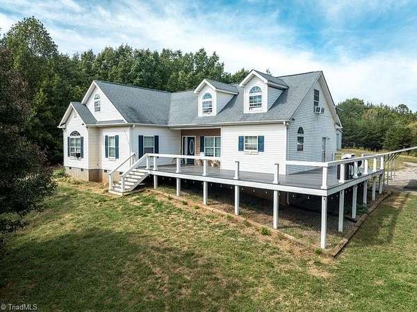 5 Acres of Land with Home for Sale in Sandy Ridge, North Carolina