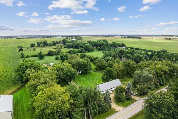 5.54 Acres of Land with Home for Sale in Harvard, Illinois