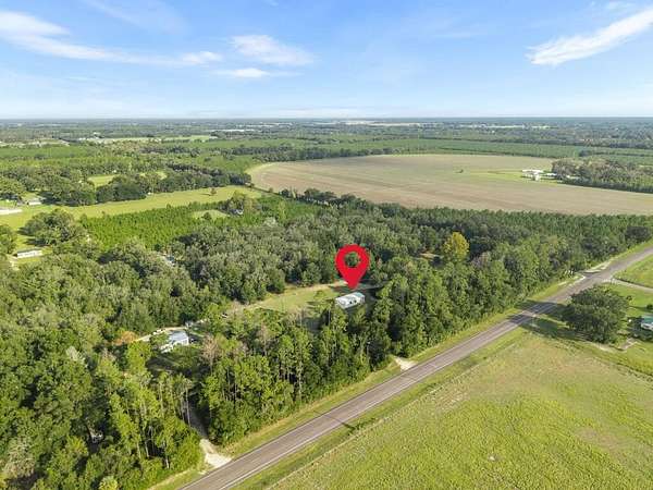 2.5 Acres of Land with Home for Sale in Trenton, Florida