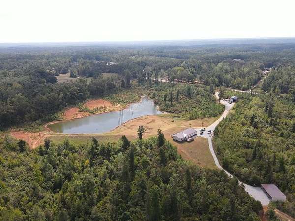 106 Acres of Land with Home for Sale in Ripley, Mississippi