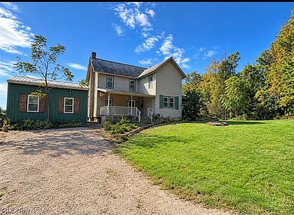 15.3 Acres of Recreational Land with Home for Sale in Blue Rock, Ohio