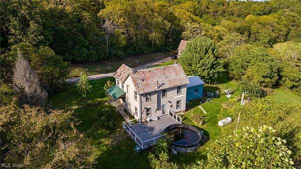 15.3 Acres of Recreational Land with Home for Sale in Blue Rock, Ohio