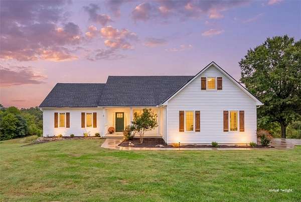 23 Acres of Land with Home for Sale in Kingsville, Missouri