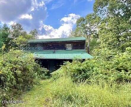 5.22 Acres of Land with Home for Sale in Lancing, Tennessee